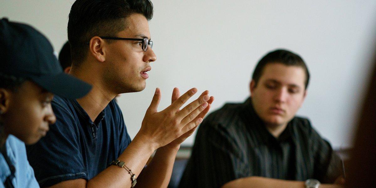 A student speaking in a seminar class